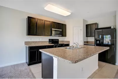 3521 Seneca Club Loop #103C, Orlando, FL 32808 - Photo 9