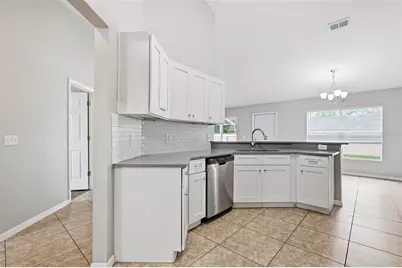 2442 Ambassador Avenue, Spring Hill, FL 34609 - Photo 11