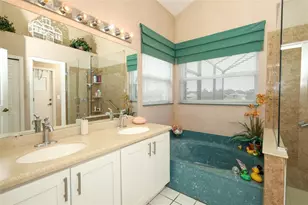 12879 Waterhaven Cir, Orlando, FL 32828 - Photo 27