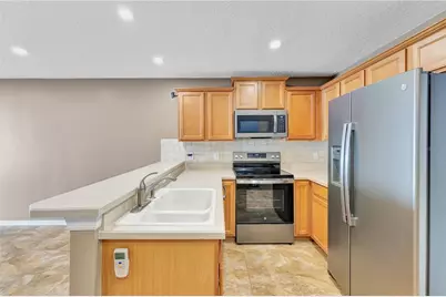 942 Coquina Rock Street, Orlando, FL 32828 - Photo 9