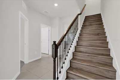 10877 Wooded Acre Alley, Orlando, FL 32829 - Photo 5