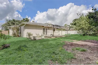 8691 Contoura Drive, Orlando, FL 32810 - Photo 23