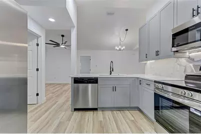 7711 Lakeside Woods Drive, Orlando, FL 32810 - Photo 15