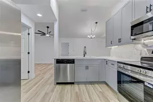 7711 Lakeside Woods Dr, Orlando, FL 32810 - Photo 15