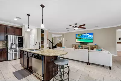 10037 Leyburn Court, Orlando, FL 32825 - Photo 7