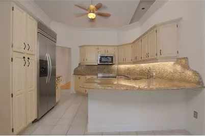 7725 Apple Tree Circle, Orlando, FL 32819 - Photo 21