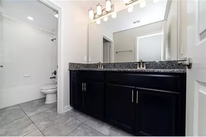 9850 Magnolia Woods Boulevard, Orlando, FL 32832 - Photo 19