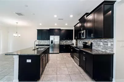 9850 Magnolia Woods Boulevard, Orlando, FL 32832 - Photo 5