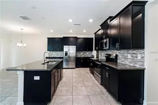 9850 Magnolia Woods Blvd, Orlando, FL 32832 - Photo 5