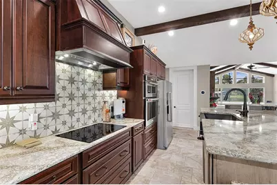 1002 Loves Point Drive, Leesburg, FL 34748 - Photo 25