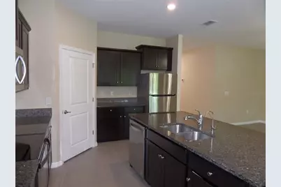 7832 Penrose Place, Wildwood, FL 34785 - Photo 11