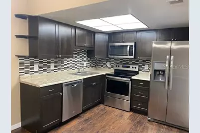 92 Windtree Lane #L, Winter Garden, FL 34787 - Photo 3