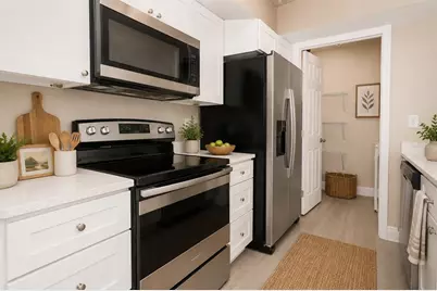 5836 Peregrine Avenue #25E, Orlando, FL 32819 - Photo 7
