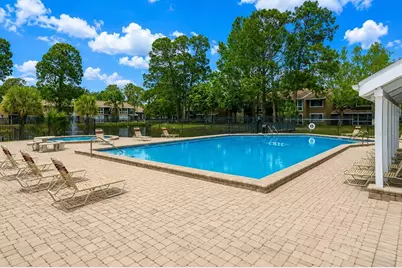 5836 Peregrine Avenue #25E, Orlando, FL 32819 - Photo 19