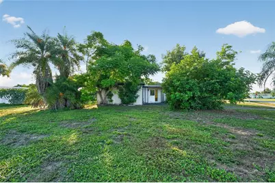 22001 Belinda Avenue, Port Charlotte, FL 33952 - Photo 1