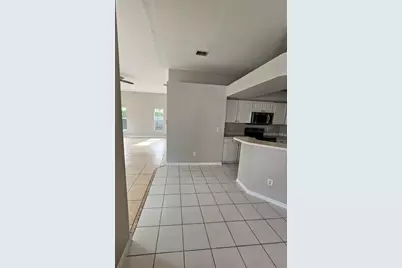 7741 Bardmoor Hill Circle, Orlando, FL 32835 - Photo 25