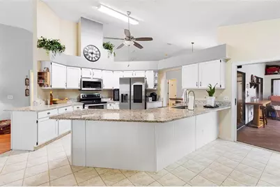 12512 Tillingham Court, Orlando, FL 32837 - Photo 7
