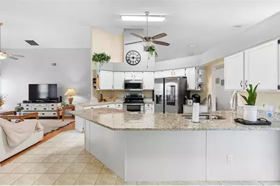 12512 Tillingham Court, Orlando, FL 32837 - Photo 9