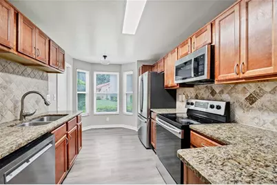 7865 Sugar View Court #7865, Orlando, FL 32819 - Photo 9