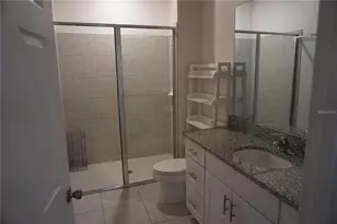 1677 Way of Peace Ln, Mascotte, FL 34753 - Photo 11