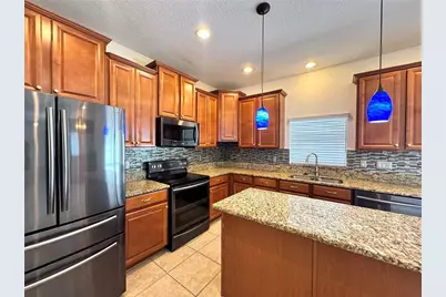 2890 Spring Breeze Way, Kissimmee, FL 34744 - Photo 15