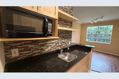 2668 Robert Trent Jones Drive #413, Orlando, FL 32835 - Photo 7