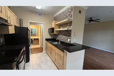 2668 Robert Trent Jones Drive #413, Orlando, FL 32835 - Photo 5