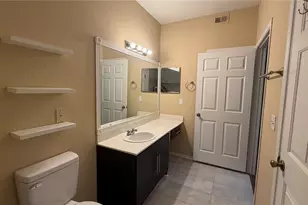 2668 Robert Trent Jones Dr, Orlando, FL 32835 - Photo 11