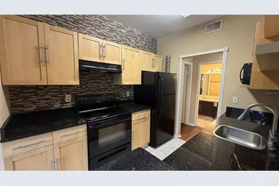 2668 Robert Trent Jones Drive #413, Orlando, FL 32835 - Photo 13