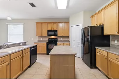 6658 Lake Pembroke Place, Orlando, FL 32829 - Photo 15