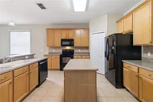 6658 Lake Pembroke Pl, Orlando, FL 32829 - Photo 15