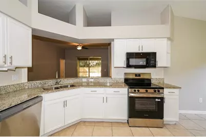 8516 Canterbury Lake Boulevard, Tampa, FL 33619 - Photo 7