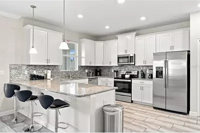 1541 Mulligan Boulevard, Champions Gate, FL 33896 - Photo 13