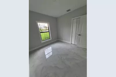 447 Wickham Avenue S, Lehigh Acres, FL 33974 - Photo 23
