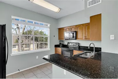 2632 Robert Trent Jones Drive #136, Orlando, FL 32835 - Photo 7