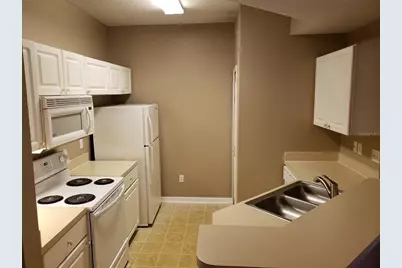 5500 Metrowest Boulevard #14-111, Orlando, FL 32811 - Photo 13