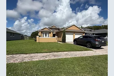 158 Magic Landings Boulevard, Kissimmee, FL 34744 - Photo 1