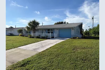 145 Dartmouth Drive NW, Port Charlotte, FL 33952 - Photo 1