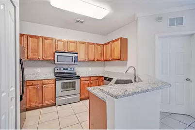 6119 Metrowest Boulevard #103, Orlando, FL 32835 - Photo 7