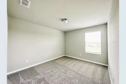 451 Whistling Duck Trail, Saint Cloud, FL 34771 - Photo 19