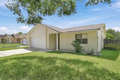 7720 Lakeside Woods Drive, Orlando, FL 32810 - Photo 17