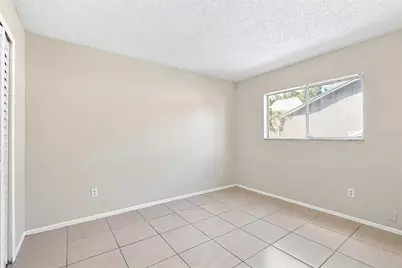 7720 Lakeside Woods Drive, Orlando, FL 32810 - Photo 11
