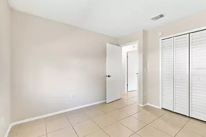 7720 Lakeside Woods Drive, Orlando, FL 32810 - Photo 13