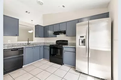 7720 Lakeside Woods Drive, Orlando, FL 32810 - Photo 7