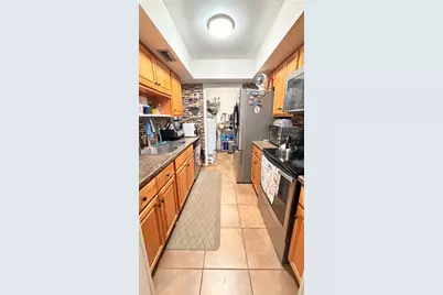 5749 Peregrine Avenue #28E, Orlando, FL 32819 - Photo 9