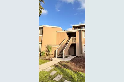 5749 Peregrine Avenue #28E, Orlando, FL 32819 - Photo 1