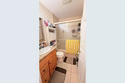 5749 Peregrine Avenue #28E, Orlando, FL 32819 - Photo 19