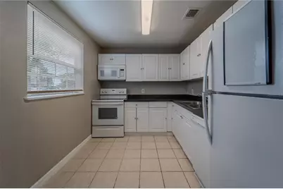4051 Dijon Drive #4051J, Orlando, FL 32808 - Photo 5