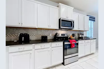 8879 Qin Loop, Kissimmee, FL 34747 - Photo 9
