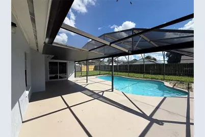 7704 Simon Ridge Court, Kissimmee, FL 34747 - Photo 5